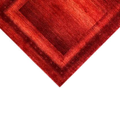 Gabbeh-Luri rug: Detail of the diagonal pattern and the red pile texture