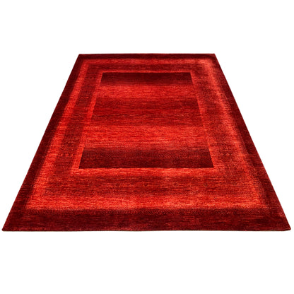 Gabbeh Luri rug in red with a central quadrilateral motif and a wide border.