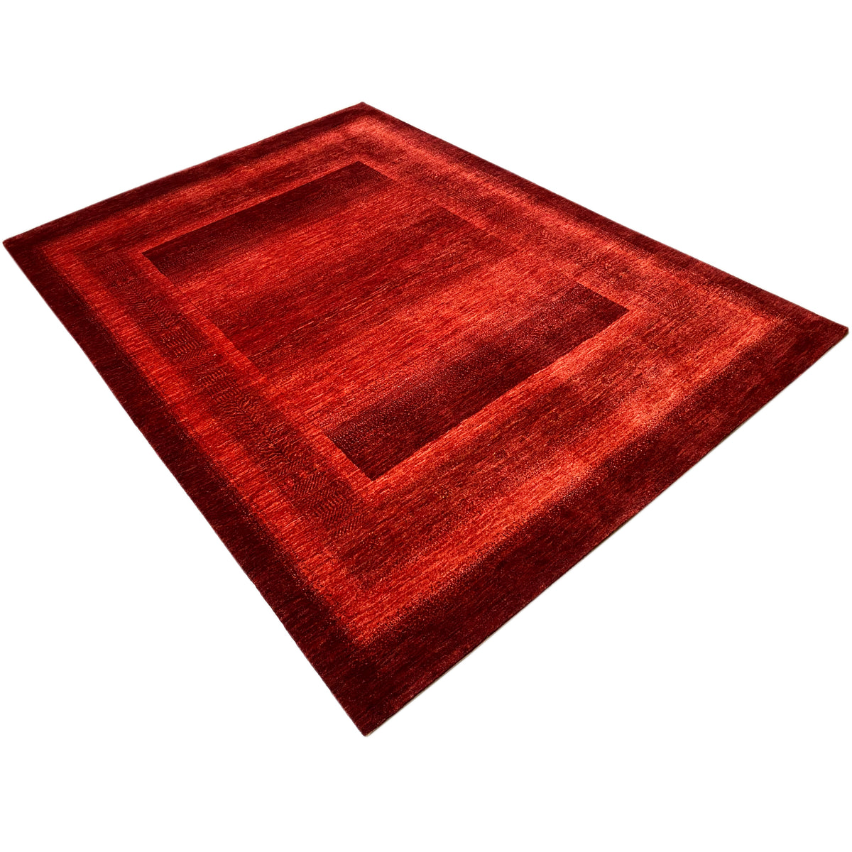 Gabbeh Luri rug in red with a large square frame motif and edge structure.