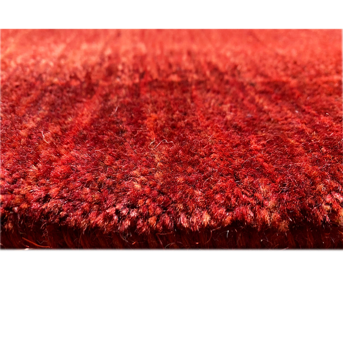 Red Gabbeh-Luri rug: Detail of the dense, even pile.