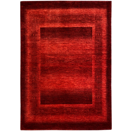 Gabbeh Luri rug in red with a rectangular pattern in the center and finished edges.