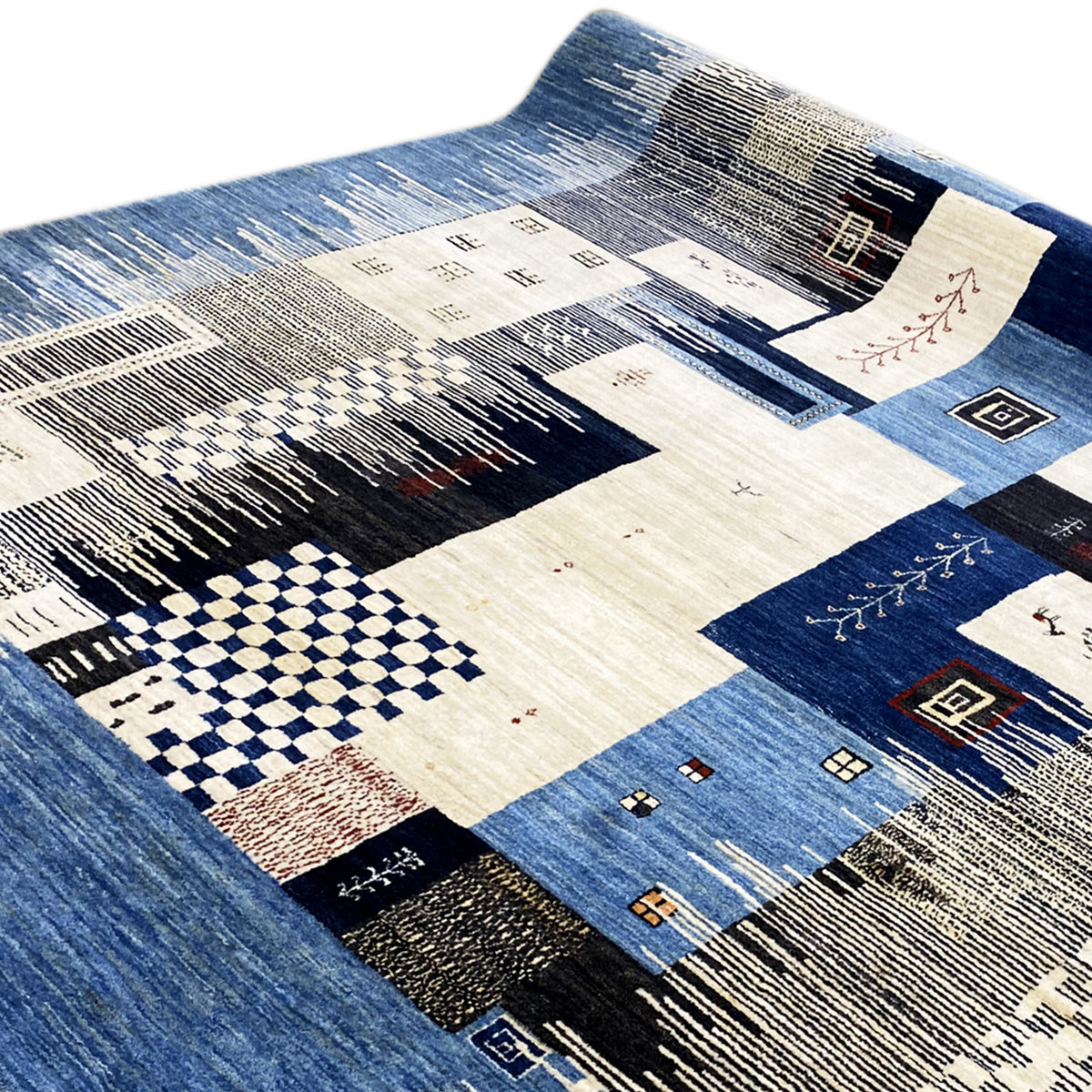 Gabbeh Luri rug 308x250 cm, blue-and-white patchwork rug with geometric pattern