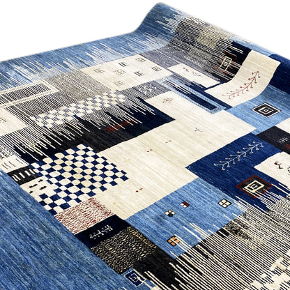 Gabbeh Luri rug 308x250 cm, blue-and-white patchwork rug with geometric pattern