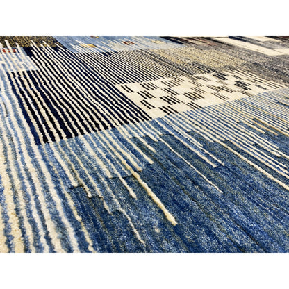 Detail view: Gabbeh rug with fine lines and patterns in blue and cream