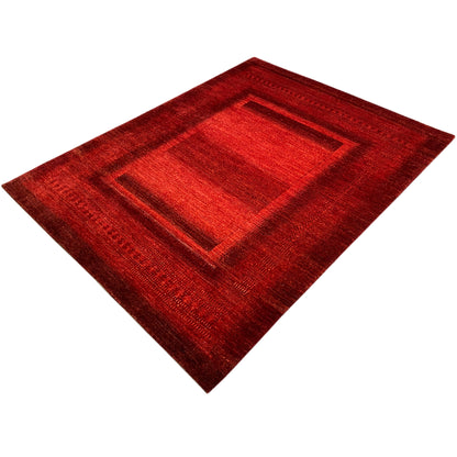 Gabbeh Luri rug, red with a graduated rectangular pattern, diagonal perspective