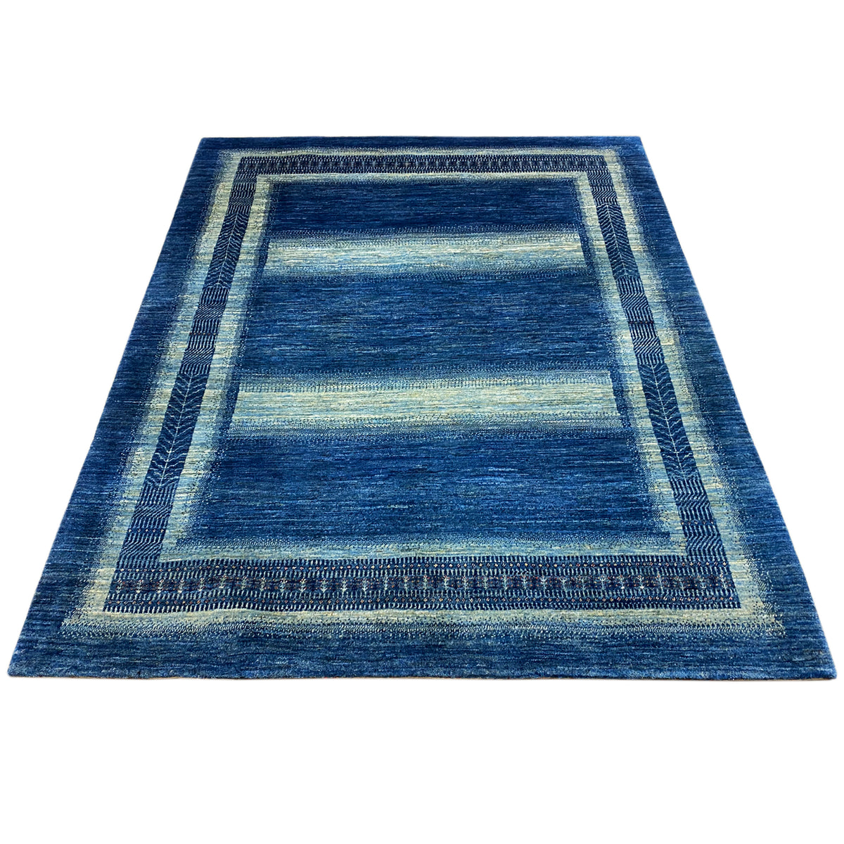 Gabbeh Luri rug, rectangular, blue with light blue longitudinal stripes and a border