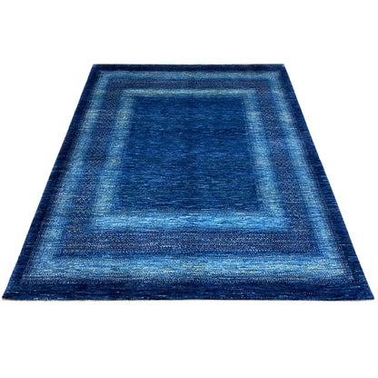 Blue rug with a border and stripe design, flat-woven texture