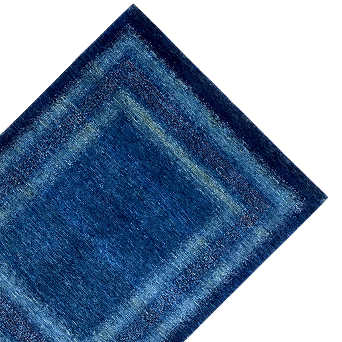 Blue rug with a centered square and surrounding color bands