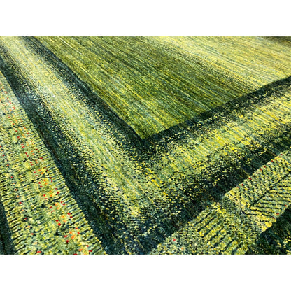 Gabbeh Luri rug 212x161 cm, close-up: green mottled texture with subtle color nuances