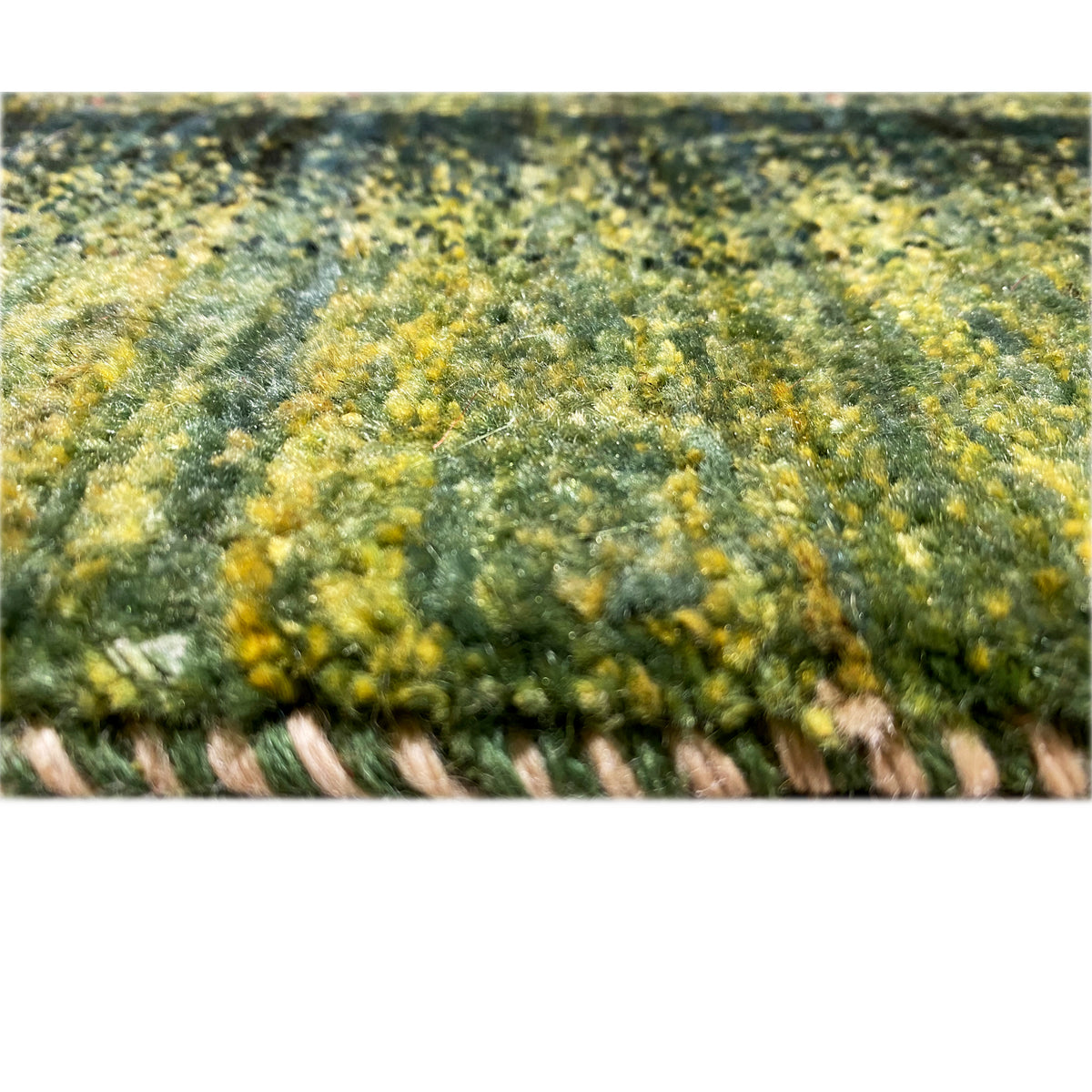Gabbeh-Luri rug 212x161 cm, close-up of the pile surface with colorful green accents