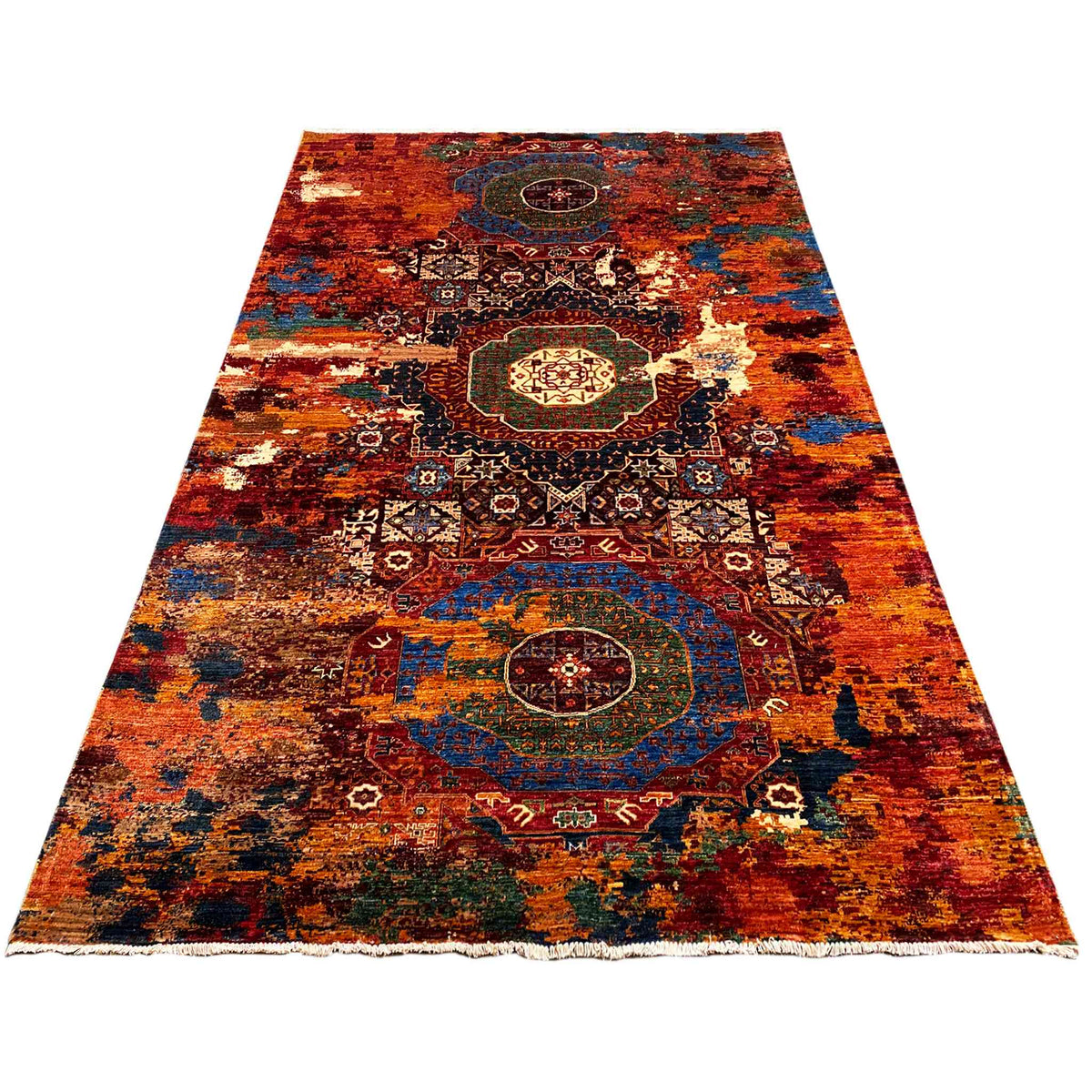 Hand-knotted Mamluk rug with borders, red-orange, blue, and gold tones, laid flat