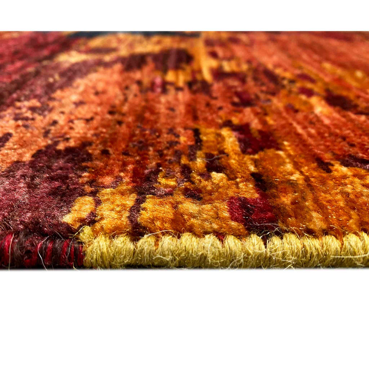 Hand-knotted Mamluk rug, close-up of the pile and fringes, reddish and golden hues