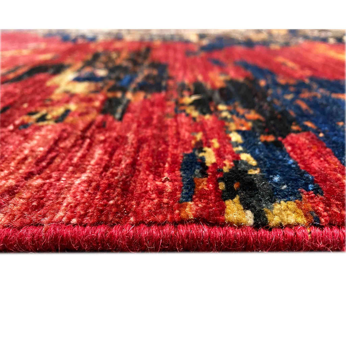 Mamluk wool rug, pile detail: red and blue pattern, unfinished rug edge