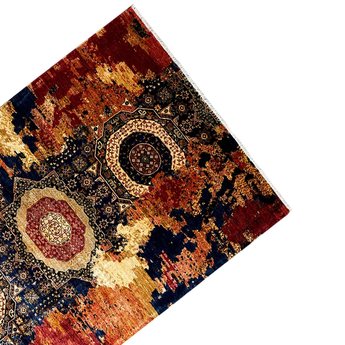 Mamluk wool rug, top view of the corner: red, blue, and beige pattern with border