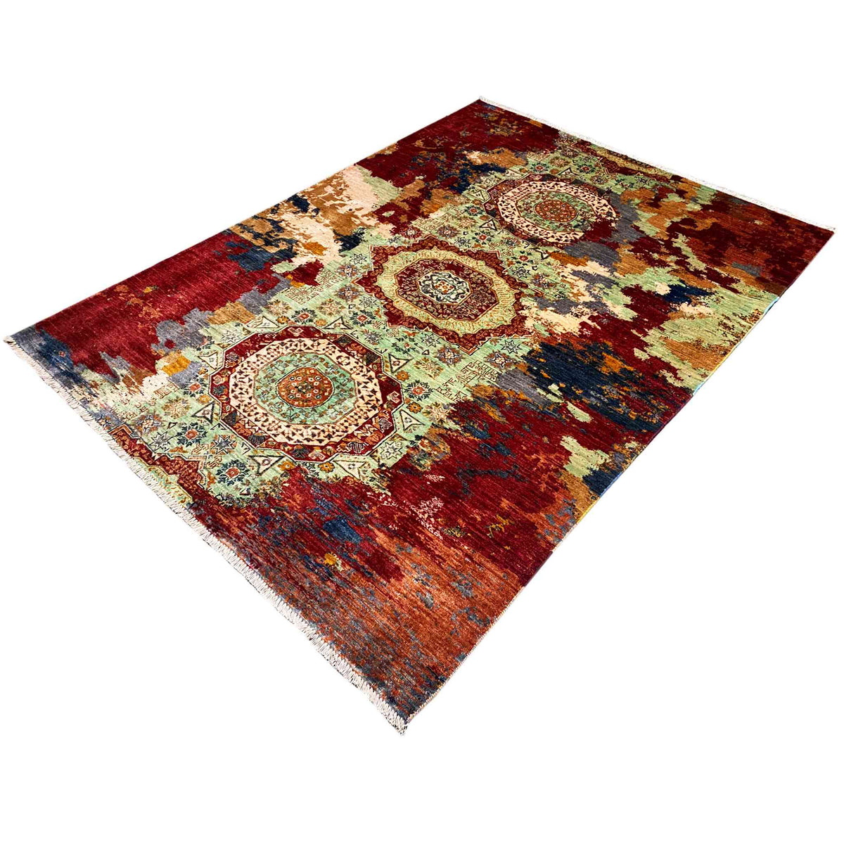 Hand-knotted Mamluk rug, diagonal close-up: medallions in red, green and blue