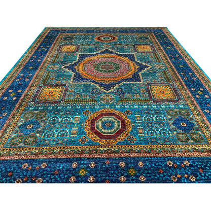 Blue rug with a large medallion, surrounding ornaments, and a delicate dotted pattern
