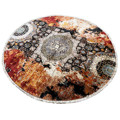 Round rug with an oriental patchwork pattern in black, red, and beige
