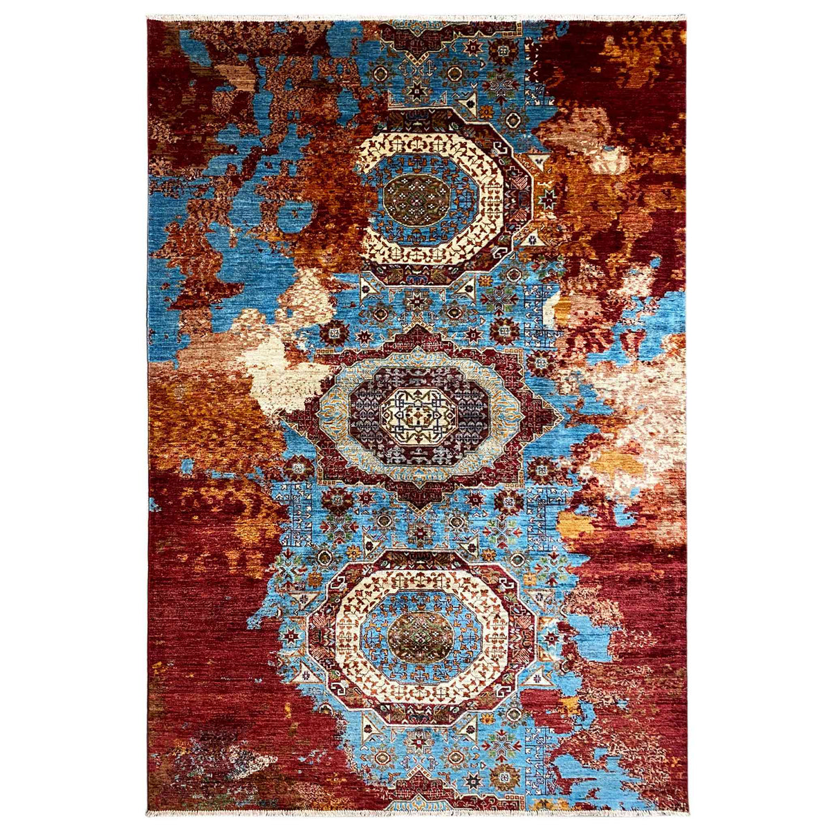 Hand-knotted rug with an oriental medallion pattern, red and blue tones