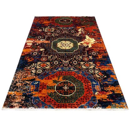 Afghan Mamluk rug, rectangular, colorful medallion design in orange, blue, and black