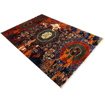Afghan Mamluk rug, colorful patterned field with a central medallion in orange and blue