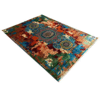 Mamluk rug in diagonal view, geometric medallions in rust brown and teal