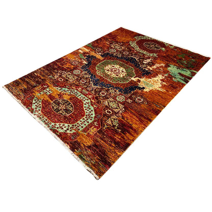 Mamluk rug, rust-brown with rich green, blue, and cream ornaments