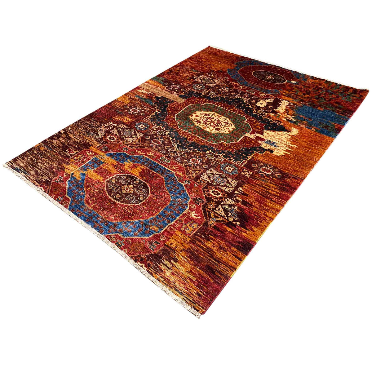 Mamluk carpet, angled view, rust brown with a blue border and geometric ornaments