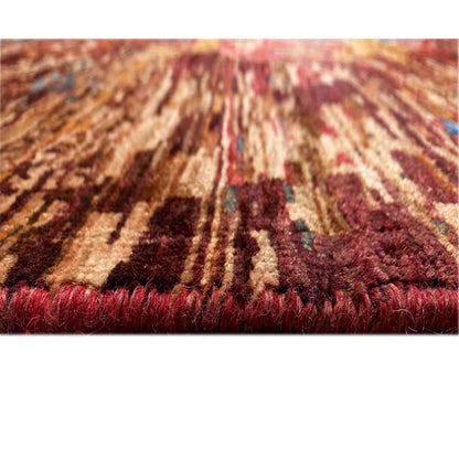 Close-up of a Mamluk rug: pile surface, rust and dark red tones with a shimmering texture