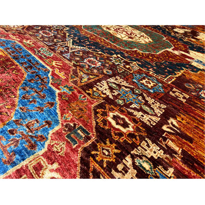 Close-up of a Mamluk carpet with intricate patterns in blue, red, and rust brown