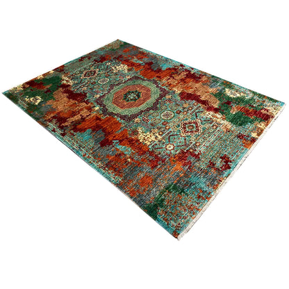 Mamluk rug, turquoise-brown cross pattern with an oval medallion, diagonal view