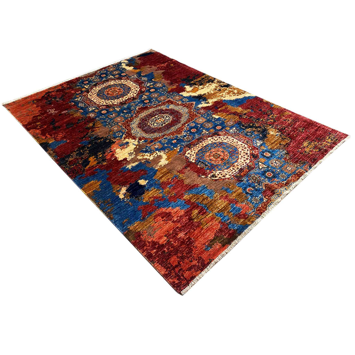 Carpet with a decorative border and medallion pattern, red-blue-gold