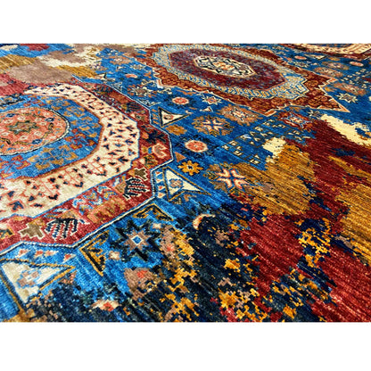 Carpet detail with ornaments, star and cross motifs, blue ground, red and gold