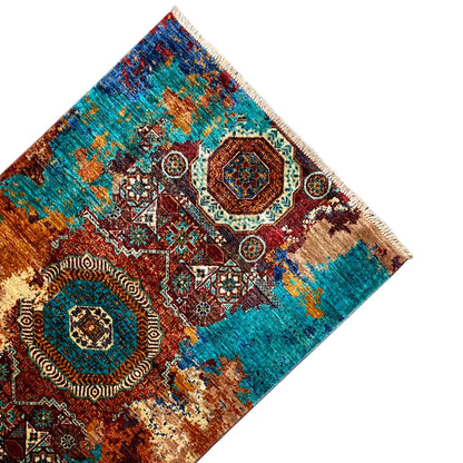 Mamluk rug with a turquoise-brown pattern and medallions, fringes visible