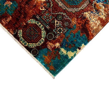 Mamluk carpet corner detail with turquoise and brown ornament and fringes along the edge