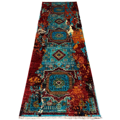 Mamluk runner rug with wide borders and a pattern in turquoise, reddish-brown, and gold, rectangular