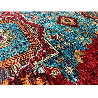 Woven runner rug with delicate ornamental details in turquoise, blue, and red, tightly woven