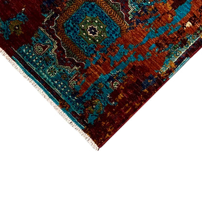 Corner of a runner rug with a turquoise ornamental field and colorful border, dense material