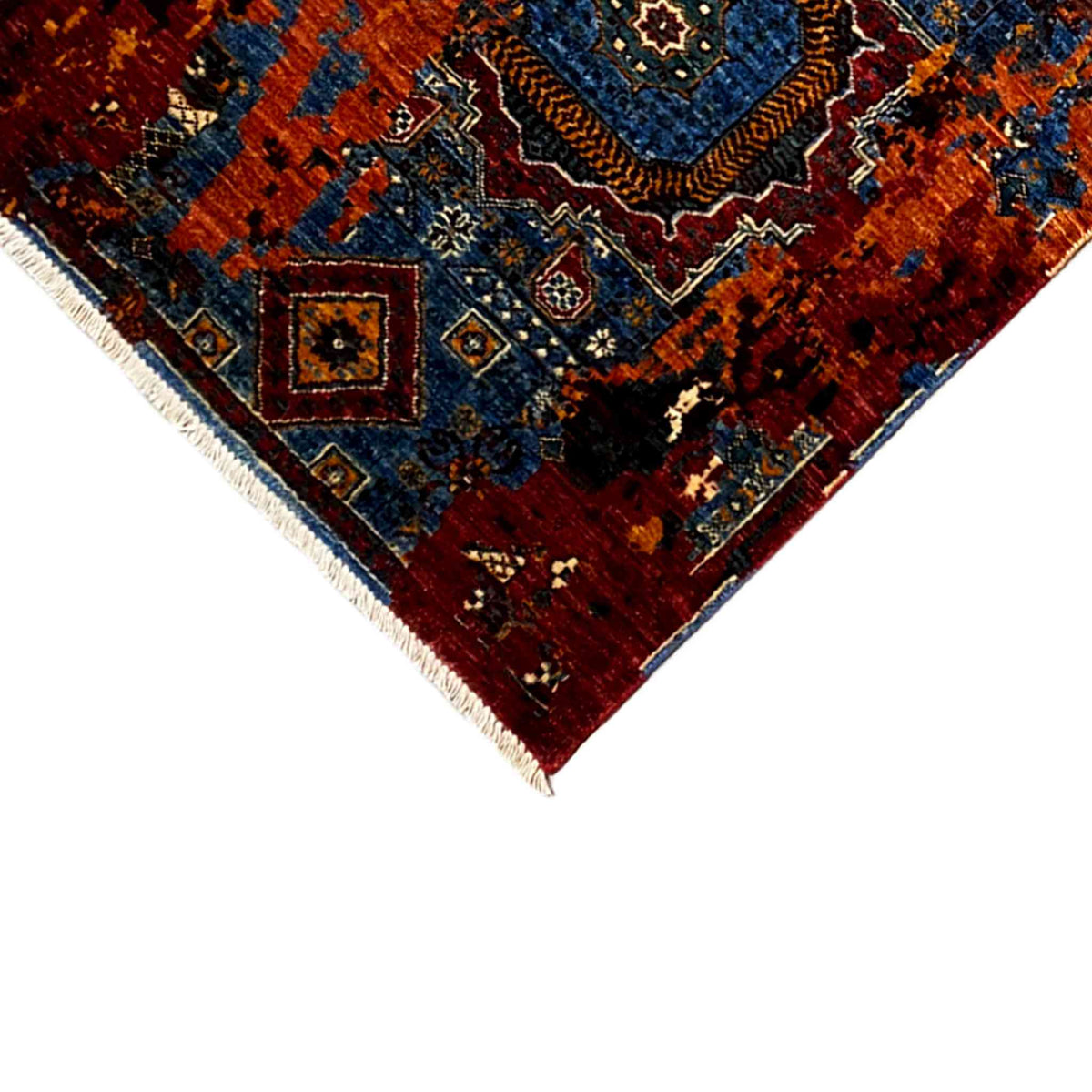 Corner of the Mamluk runner rug: floral ornamental pattern, red and blue, twisted border