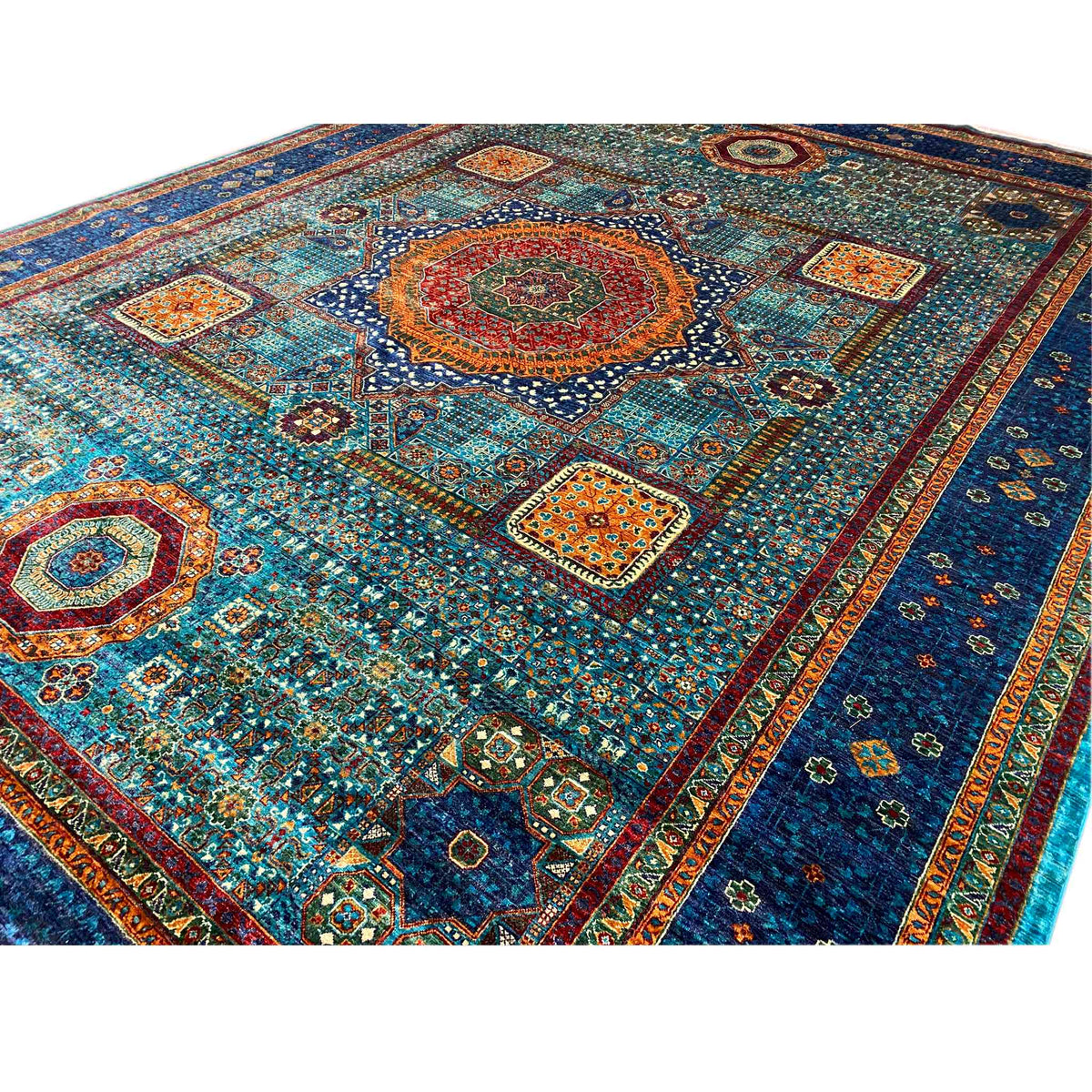 Hand-knotted Mamluk carpet close-up: medallion, tile motifs and fine embellishments