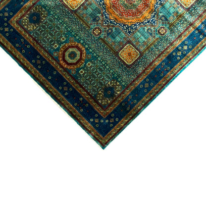 Hand-knotted Mamluk rug, corner view with border, turquoise-blue background and pattern