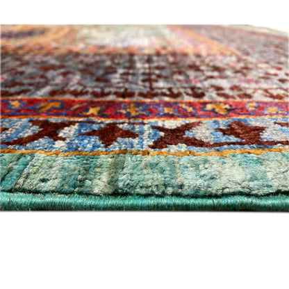 Hand-knotted Mamluk rug edge with dense pile and turquoise border