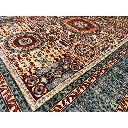Carpet detail with delicate patterns, medallions, and border in blue, red, and cream