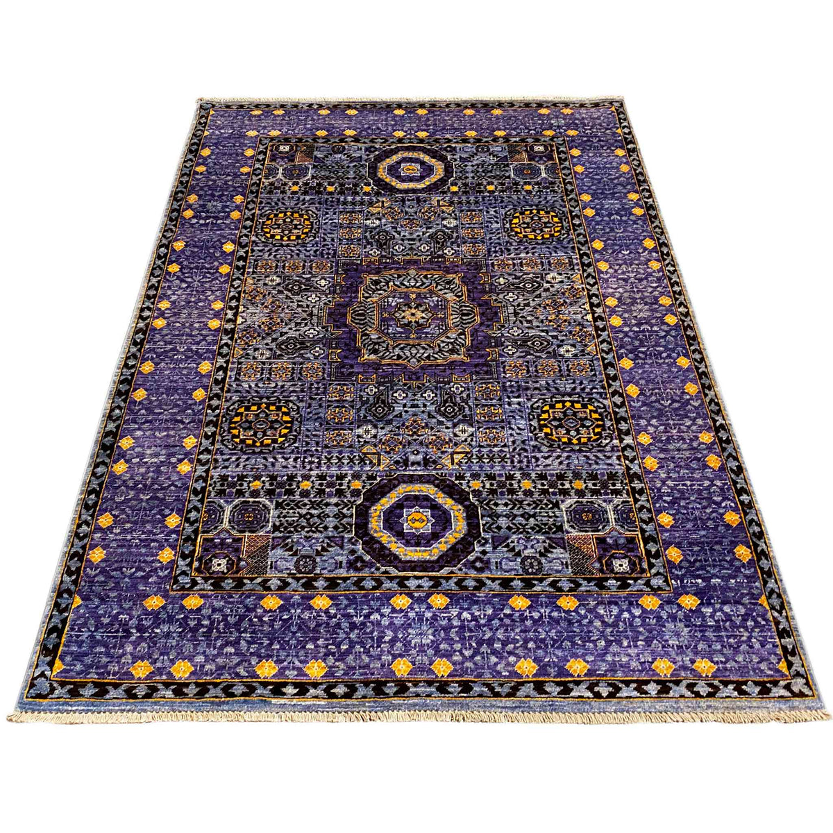 Rug with a blue ground and floral and geometric ornaments in the central area