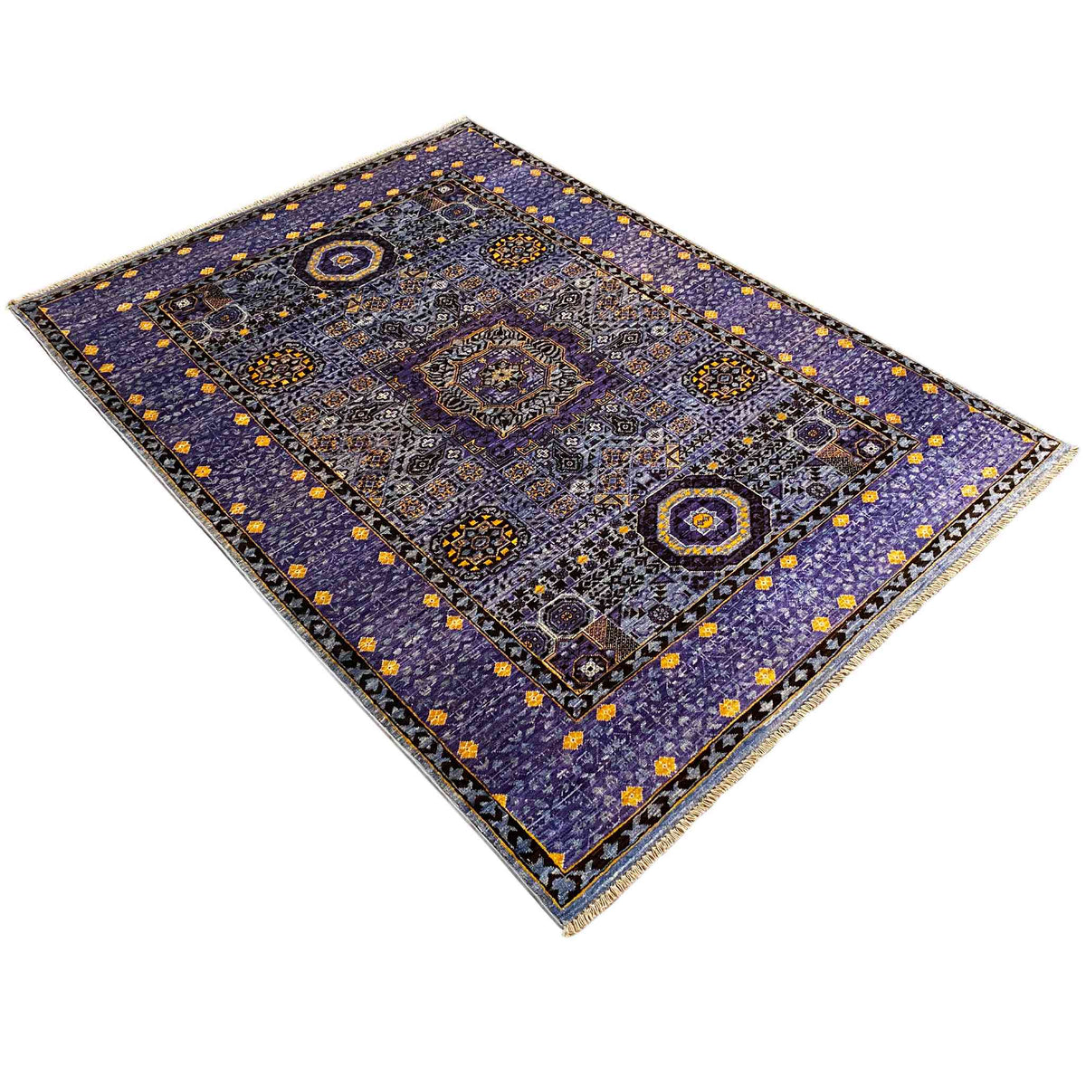 Rectangular rug in blue-purple with yellow dots and a decorative border