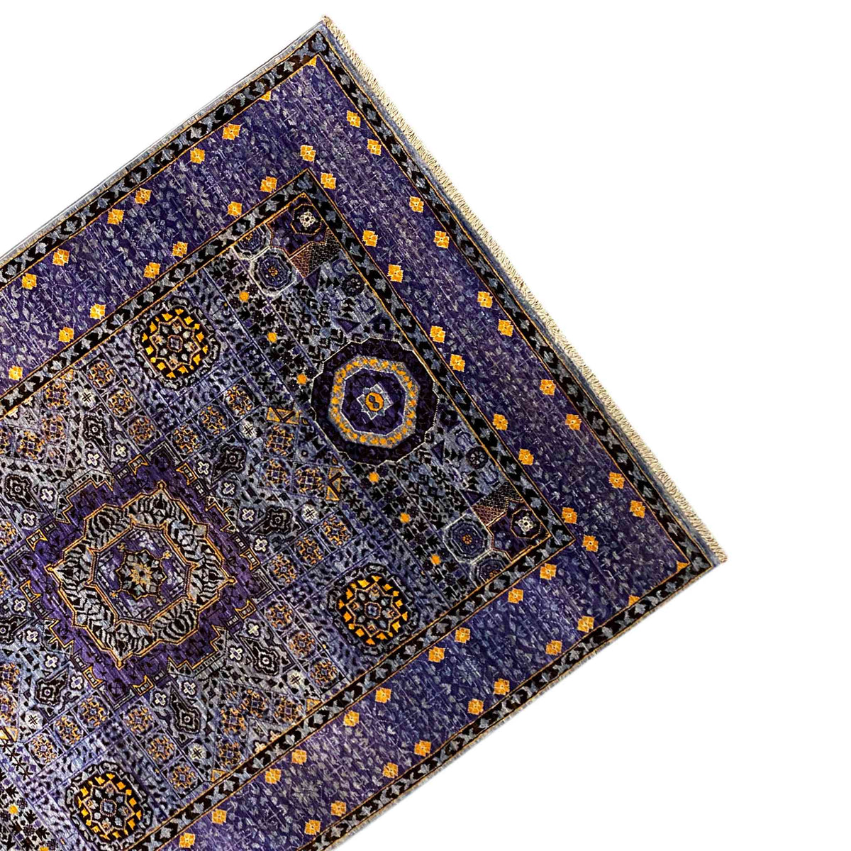 Carpet corner with an ornamental border, blue-purple background, and small yellow diamonds