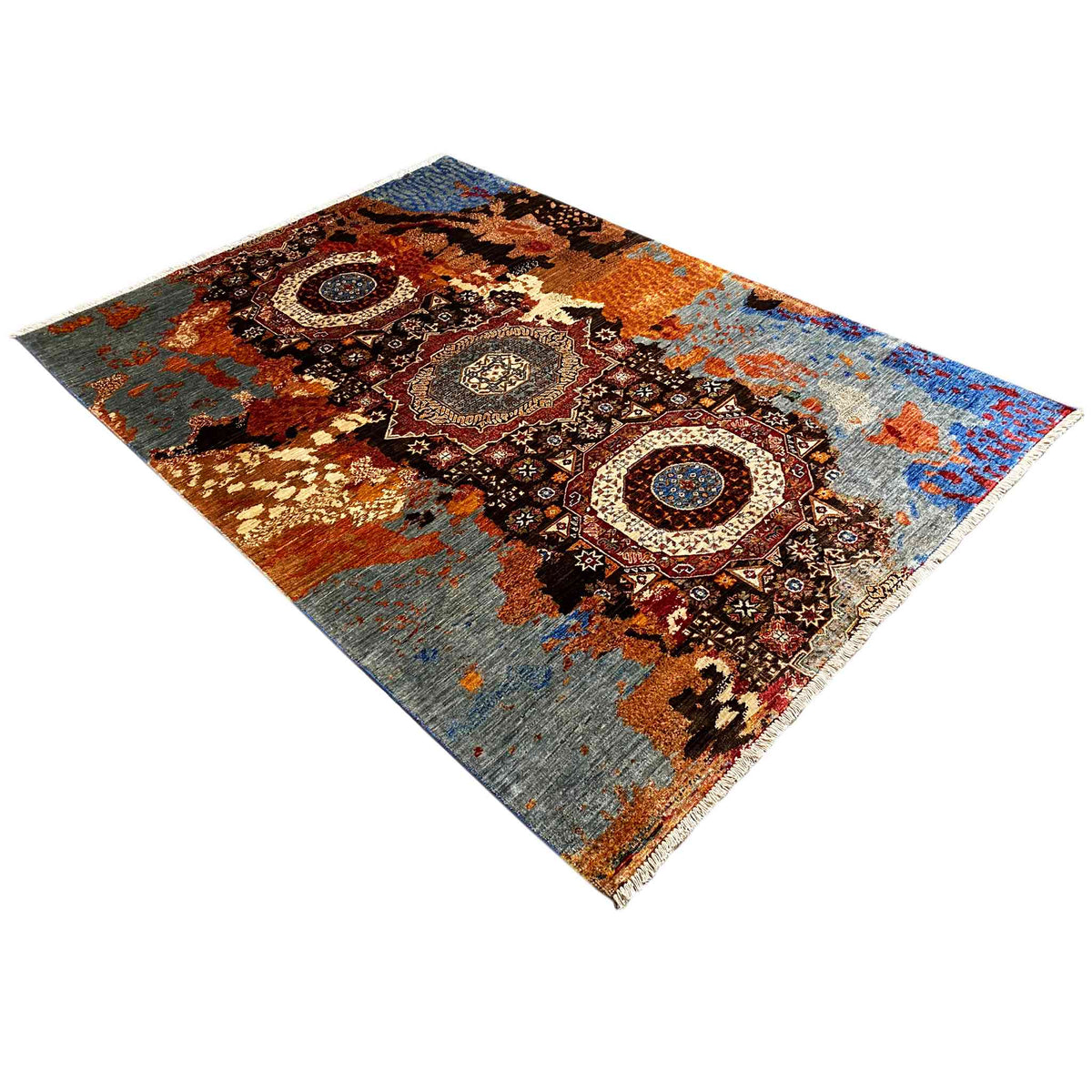 Hand-knotted Mamluk rug spread out, corner view with ornamental panels in brown, blue, and gray