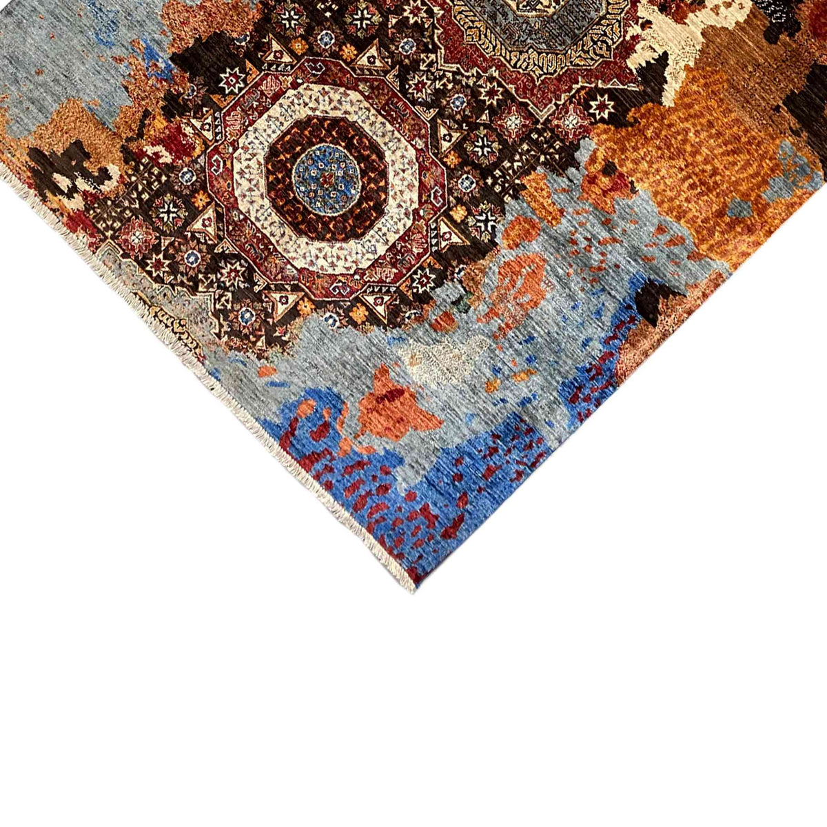 Hand-knotted Mamluk rug corner detail: border and pattern in blue, brown and gray