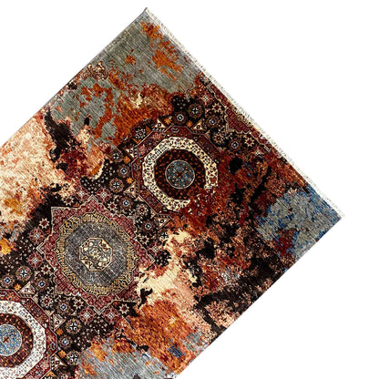 Mamluk rug corner with an ornamental medallion in brown, orange, blue and cream