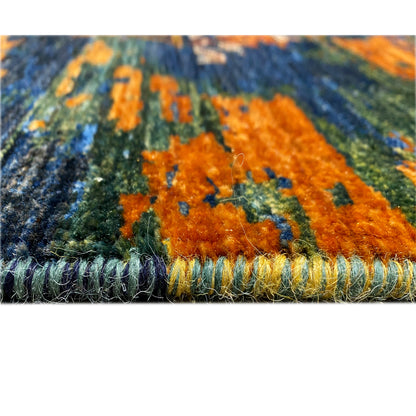 Back or close-up view of the rug’s edge: dense pile with a multicolored border