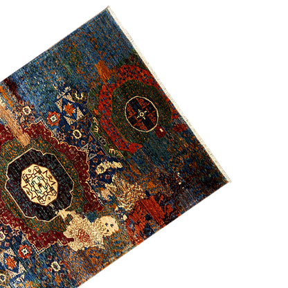 Hand-knotted Mamluk rug shown from the side, pattern with round medallions and ornaments